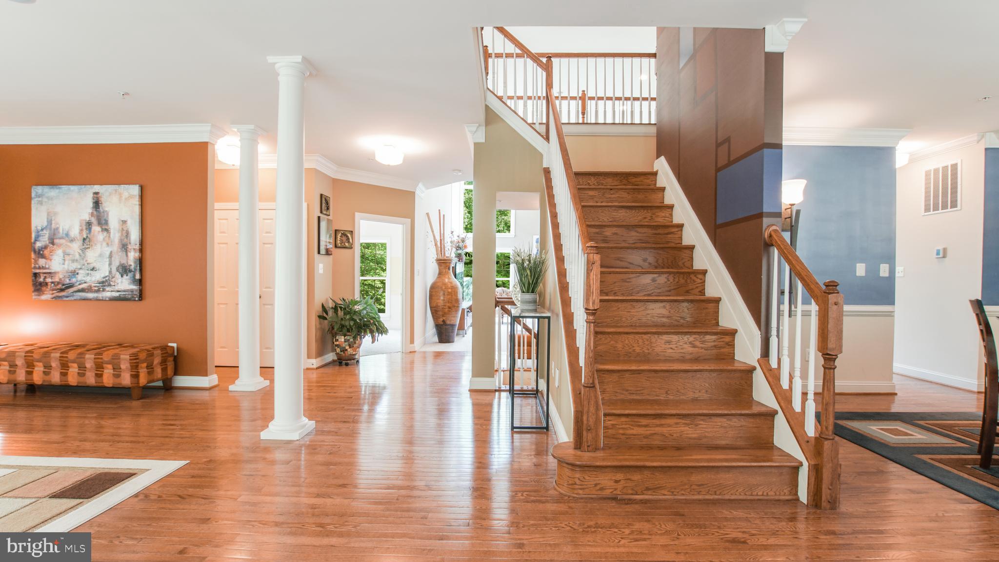 8901 Normal School Road Bowie, MD 20715 - Photo 6 of 82 VIEW OF FRONT STAIRWAY AND LANDING