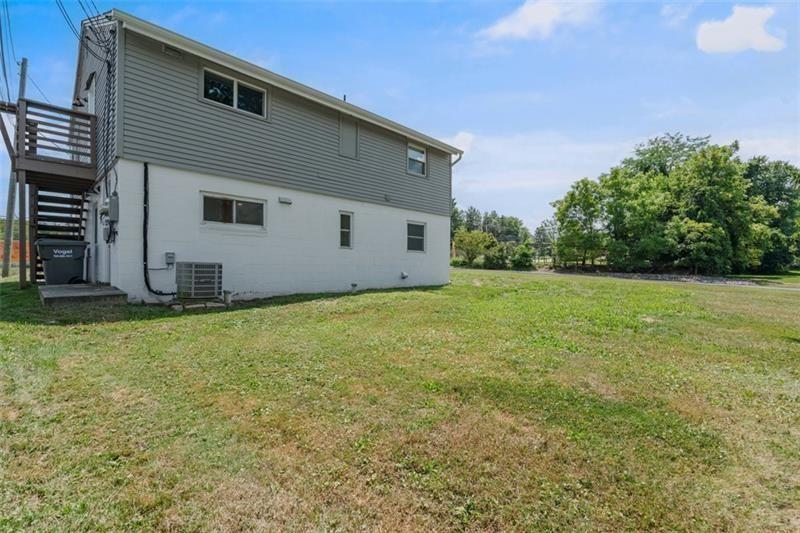 1122 Pittsburgh Road Valencia, PA 16059 - Photo 3 of 18 a house with a yard