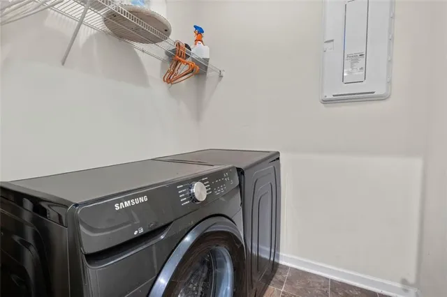 a utility room with dryer and washer