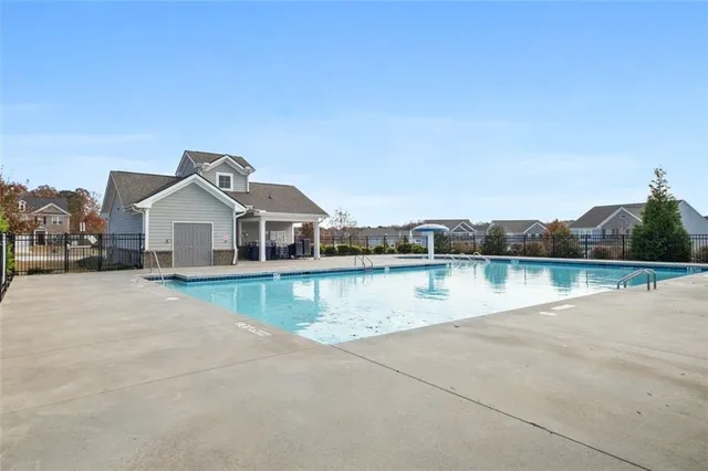a view of a house with a lake view