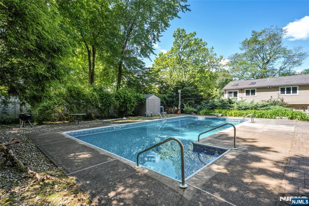 21 Marcia Road Ringwood, NJ 07456 - Photo 35 of 42 a view of a backyard with swimming pool