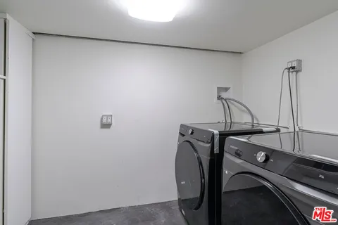 a patio with patio a couch and chairs