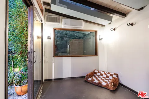 a view of a pathway that has a yard