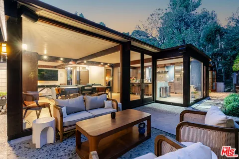 a backyard of a house with seating space