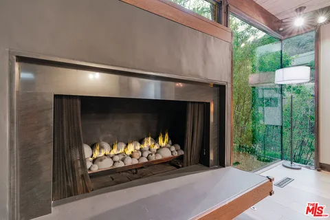 a living room with fireplace