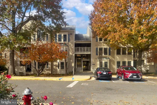 a view of a street with cars