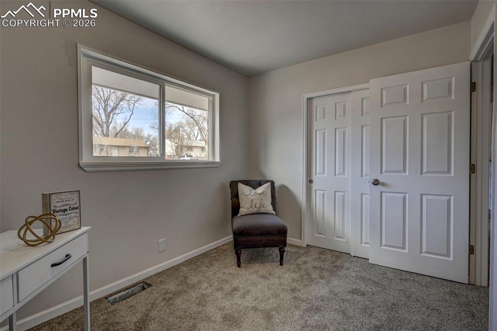 701 Erie Road Colorado Springs, CO 80910 - Photo 18 of 27 a living room with furniture and a window