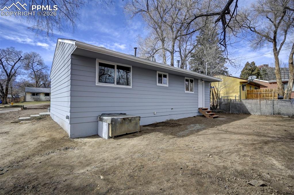 701 Erie Road Colorado Springs, CO 80910 - Photo 22 of 27 a view of a backyard