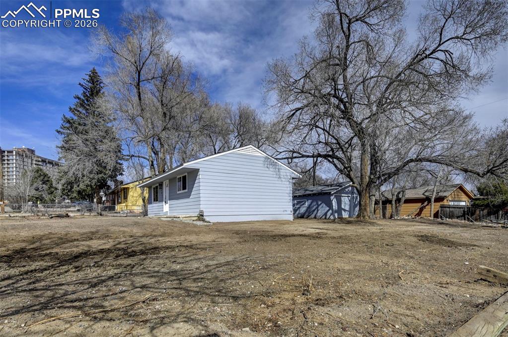 701 Erie Road Colorado Springs, CO 80910 - Photo 27 of 27 a house with large trees