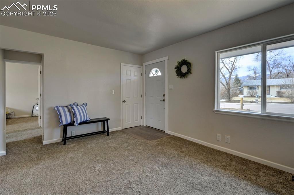 701 Erie Road Colorado Springs, CO 80910 - Photo 7 of 27 a view of a big room with windows and lounge chair
