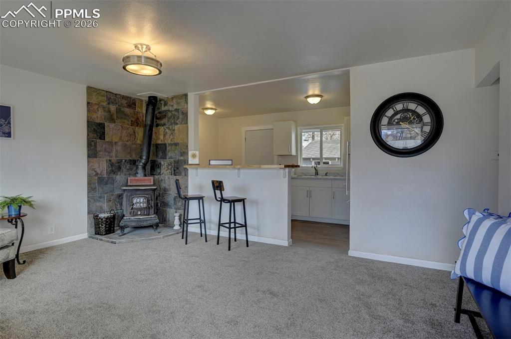 701 Erie Road Colorado Springs, CO 80910 - Photo 8 of 27 a view of a kitchen with furniture and a window