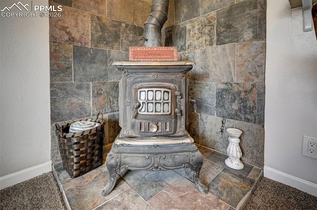 701 Erie Road Colorado Springs, CO 80910 - Photo 10 of 27 a balcony with table and chairs