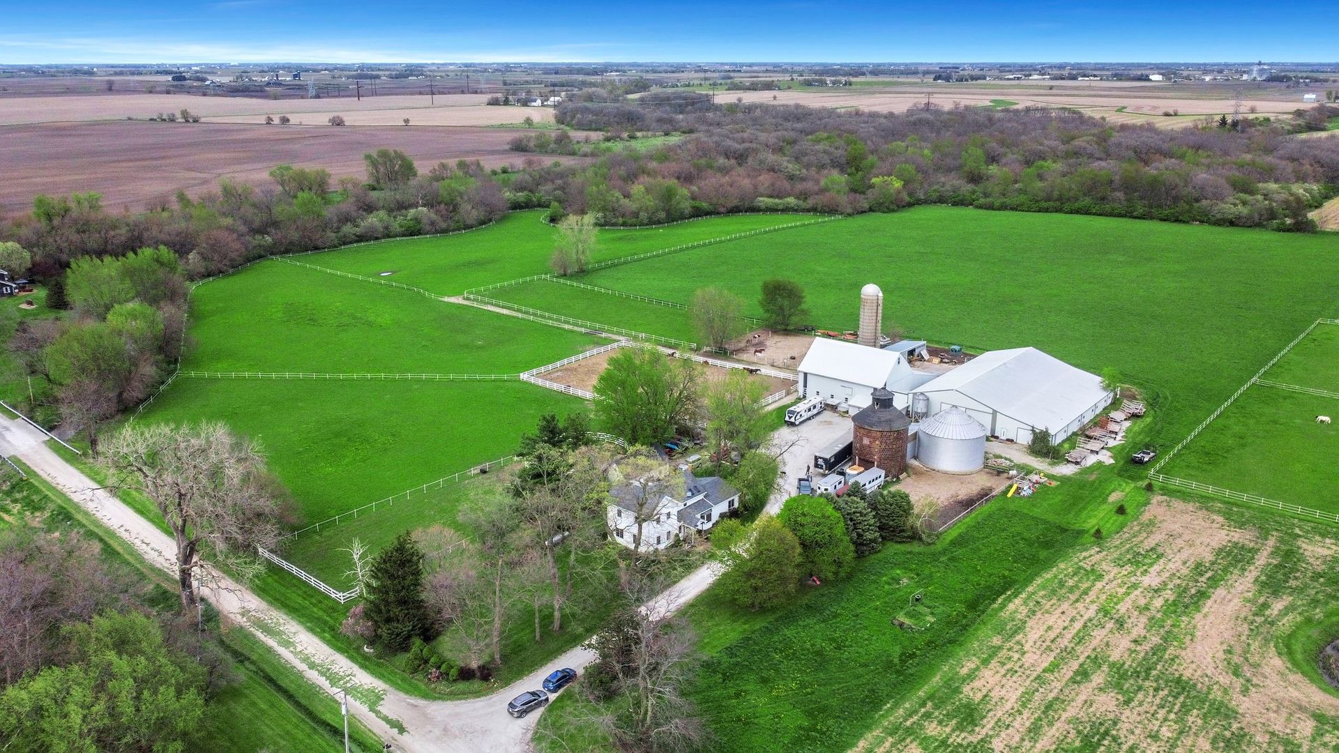 an aerial view of a house with a garden
