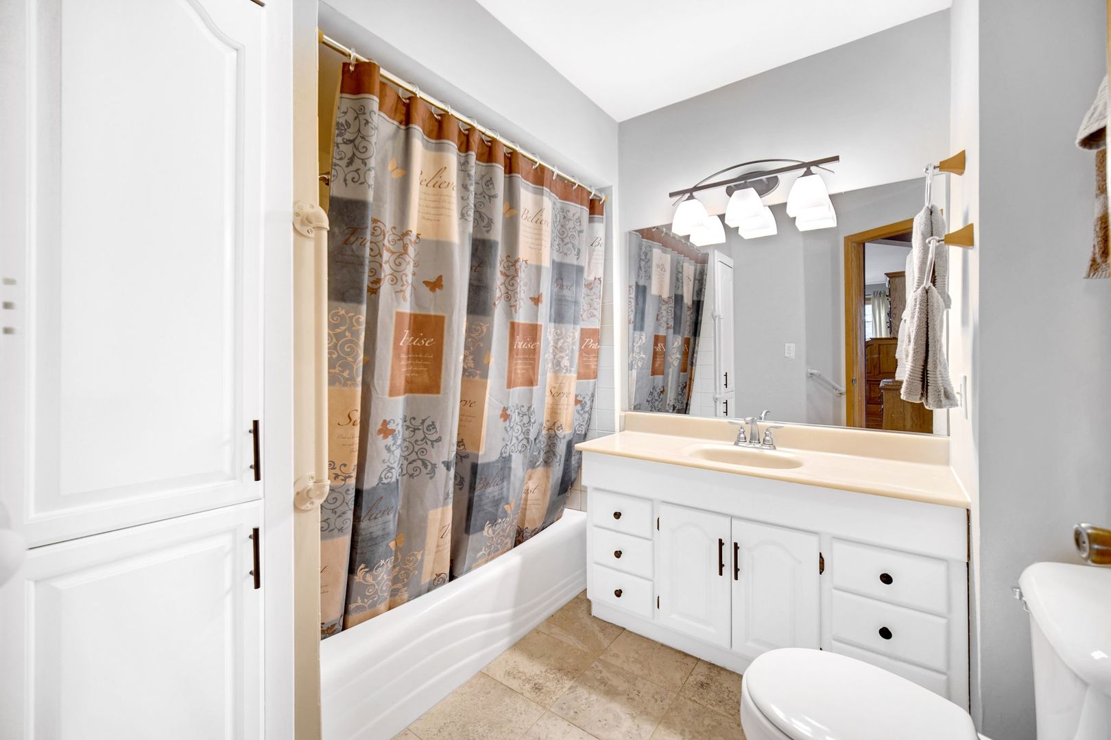32443 Wilton Road Manteno, IL 60950 - Photo 15 of 48 a bathroom with a double vanity sink toilet and shower