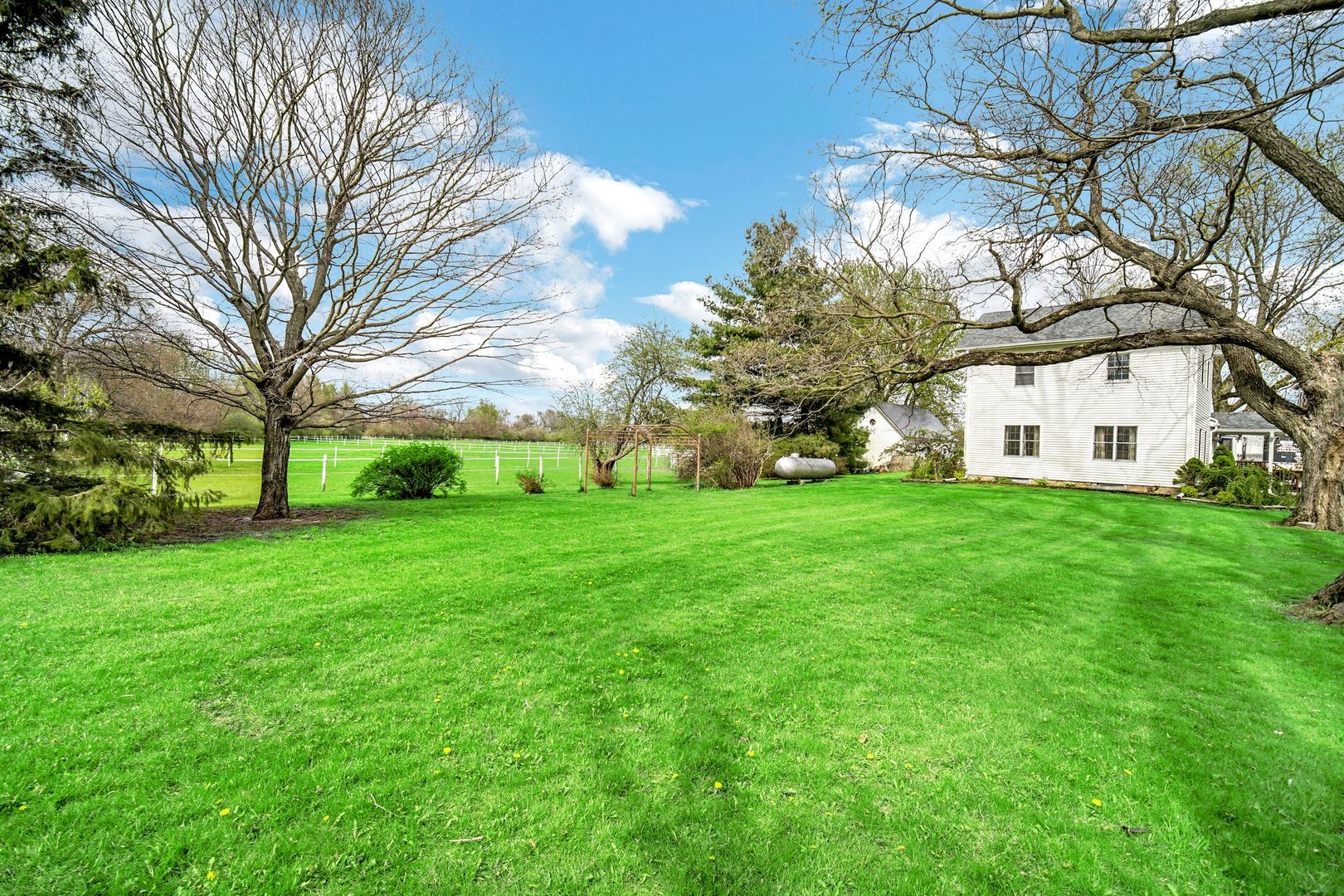 32443 Wilton Road Manteno, IL 60950 - Photo 3 of 48 a view of a house with a yard