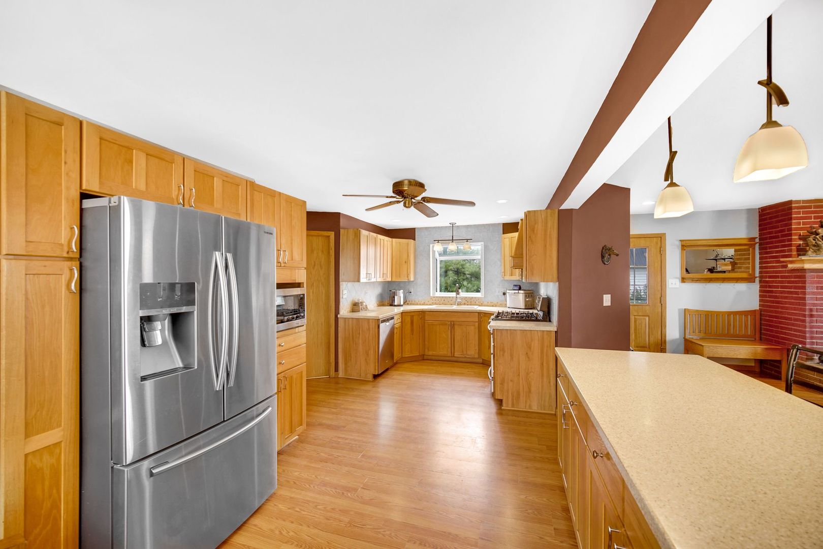 32443 Wilton Road Manteno, IL 60950 - Photo 10 of 48 a kitchen with stainless steel appliances a refrigerator and a stove