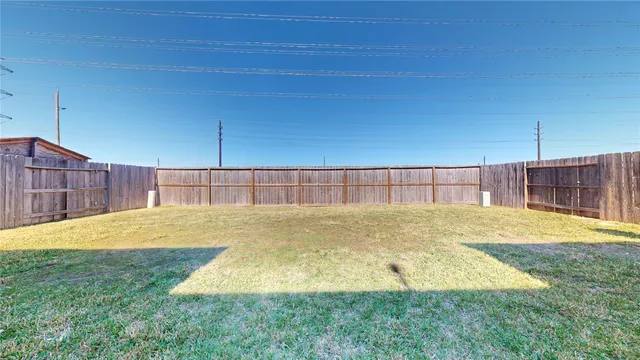 a view of a backyard with a garden