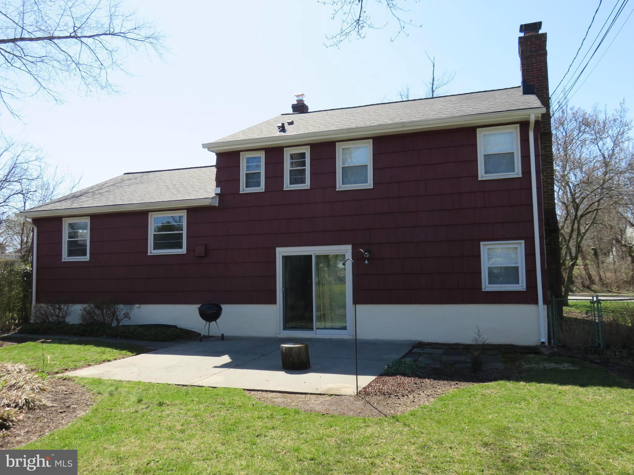 8219 Thornton Road Towson, MD 21204 - Photo 2 of 30 SLIDERS FROM LOWER LEVEL TO PATIO/YARD