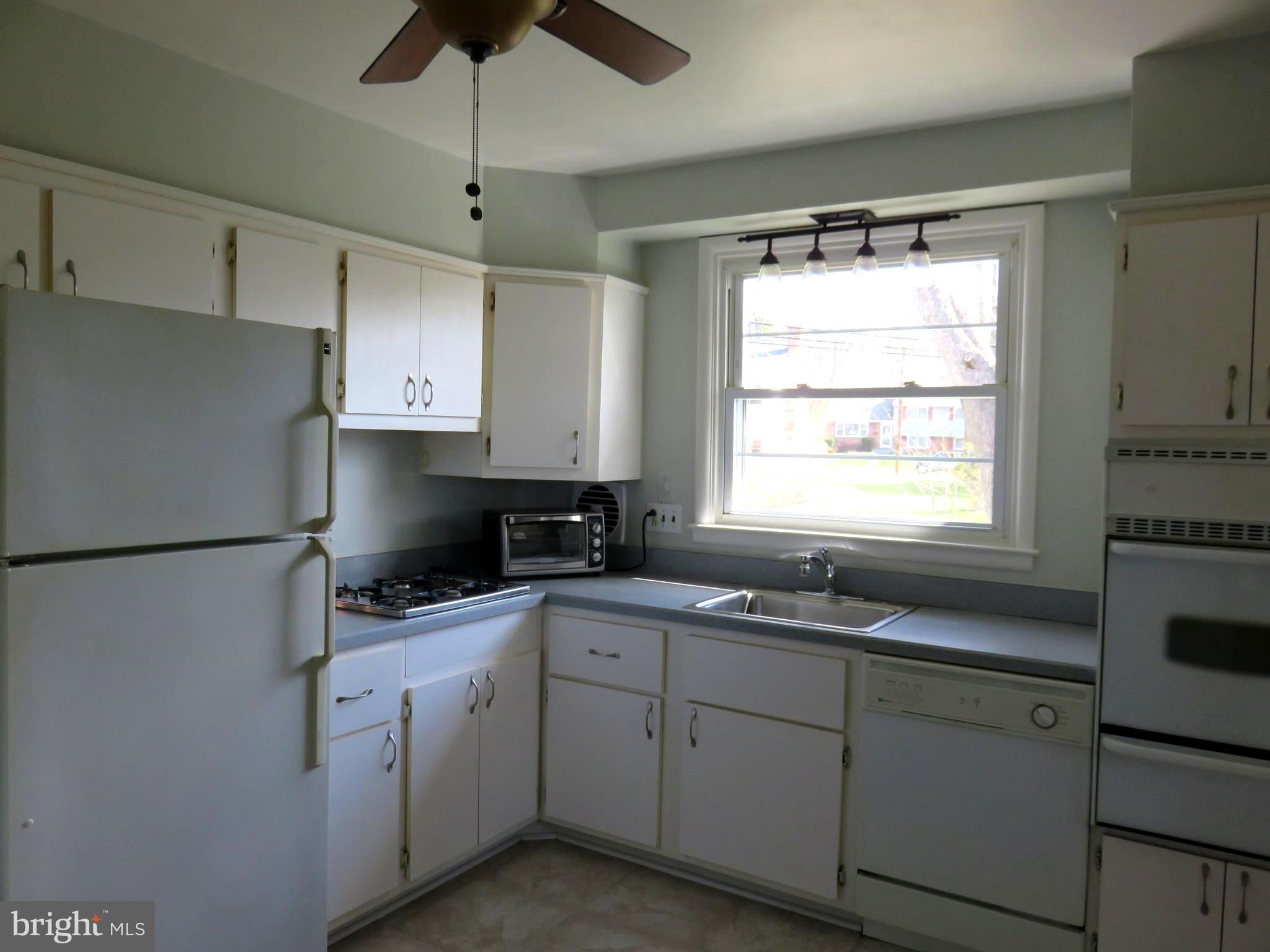 8219 Thornton Road Towson, MD 21204 - Photo 11 of 30 LOTS OF CABINETS/CEILING FAN