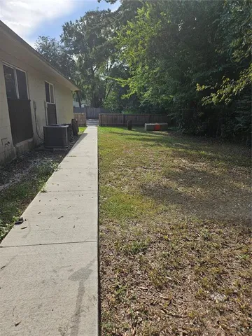 a view of backyard with green space