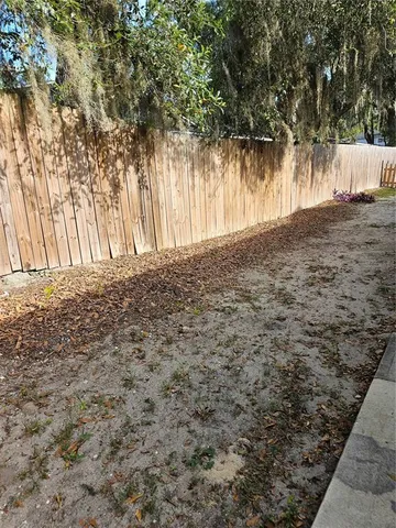 a view of a back yard of the house