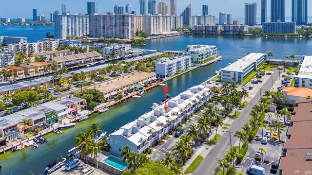 a view of a lake with a lot of flower garden