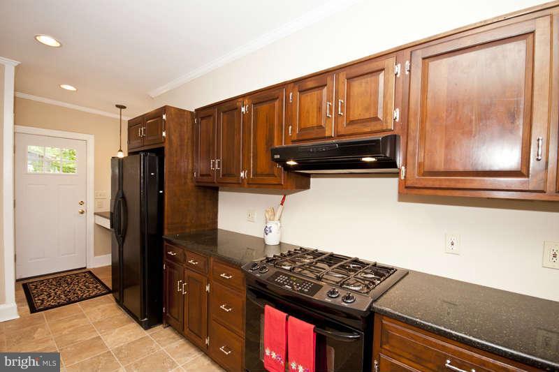 705 Dunkirk Road Baltimore, MD 21212 - Photo 6 of 24 Updated Kitchen with Breakfast Bar