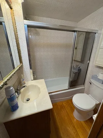 a bathroom with a sink and a toilet