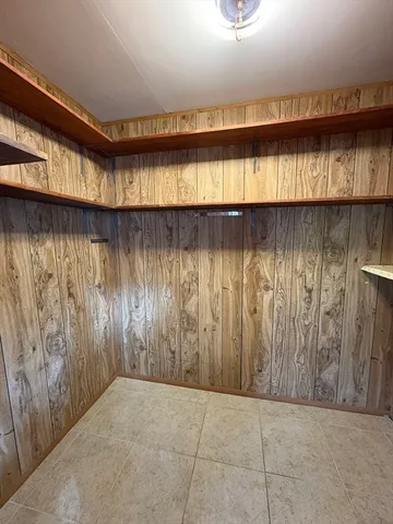 a view of a pool with a yard