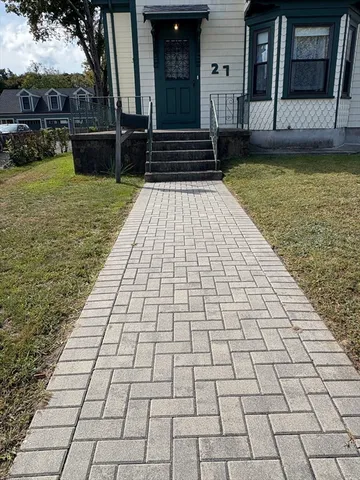 a view of a backyard of the house