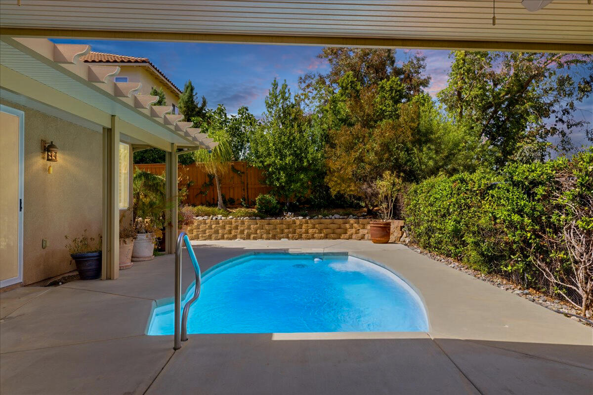 23732 Bella Vista Road Corona, CA 92883 - Photo 33 of 49 a view of a swimming pool with an outdoor seating