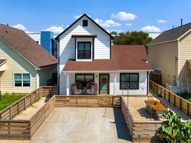 a view of a house with a swimming pool