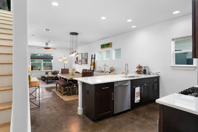 a room with lots of counter top space and a sink