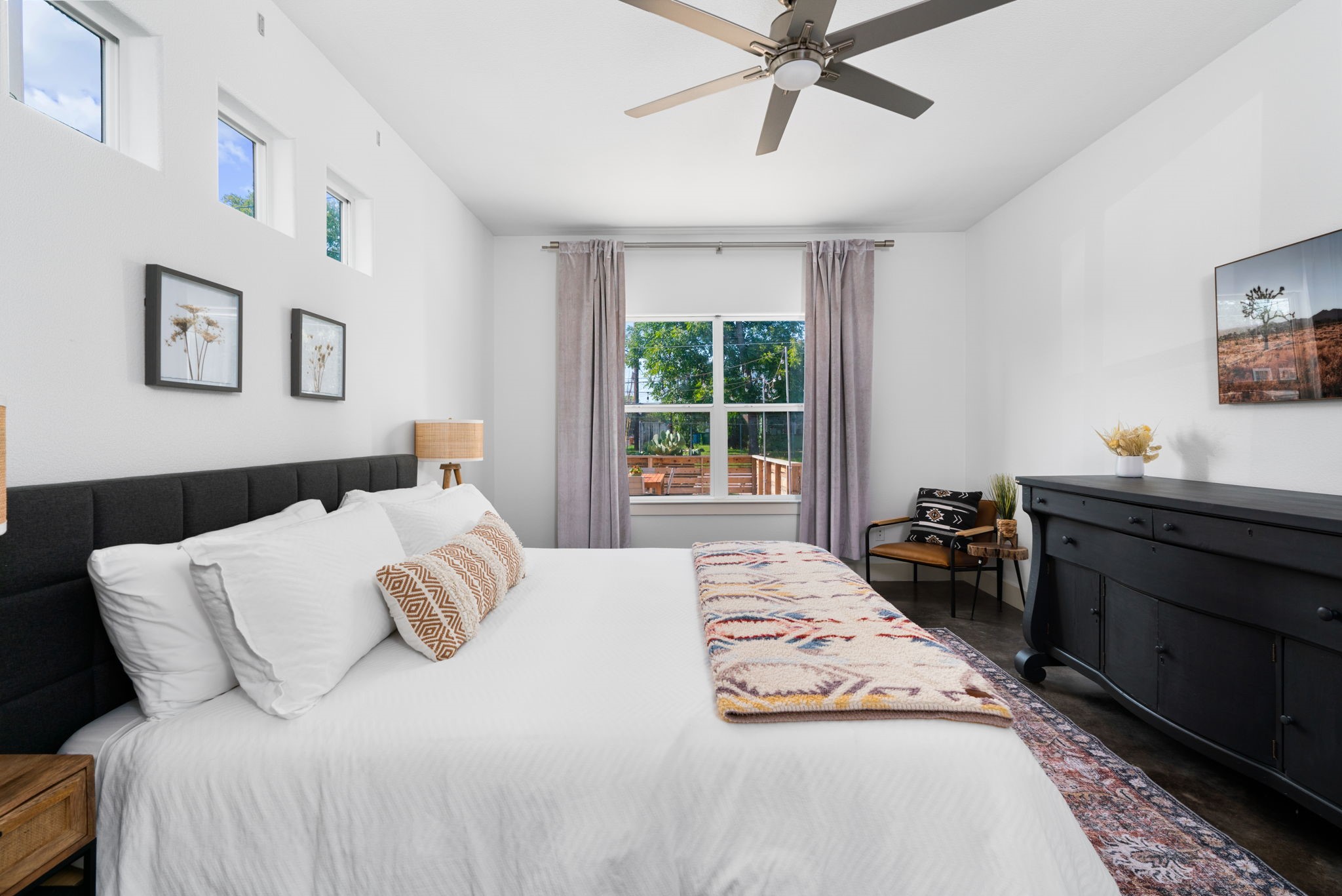 3012 Neal Street Austin, TX 78702 - Photo 21 of 39 a bedroom with a bed and a window