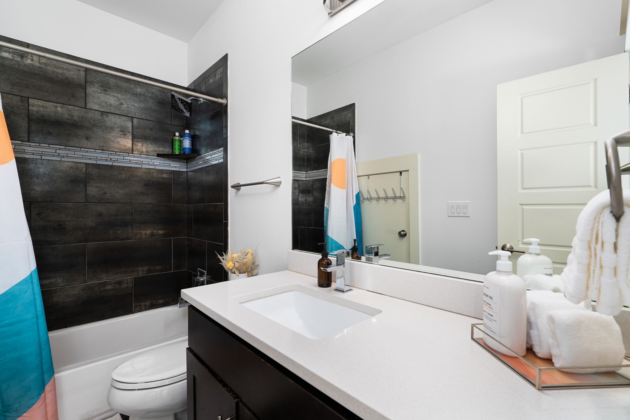 3012 Neal Street Austin, TX 78702 - Photo 25 of 39 a bathroom with a sink a toilet and shower