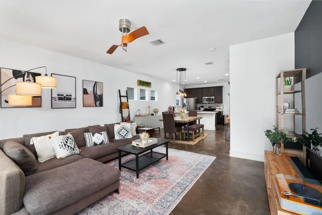 a living room with furniture and a couch