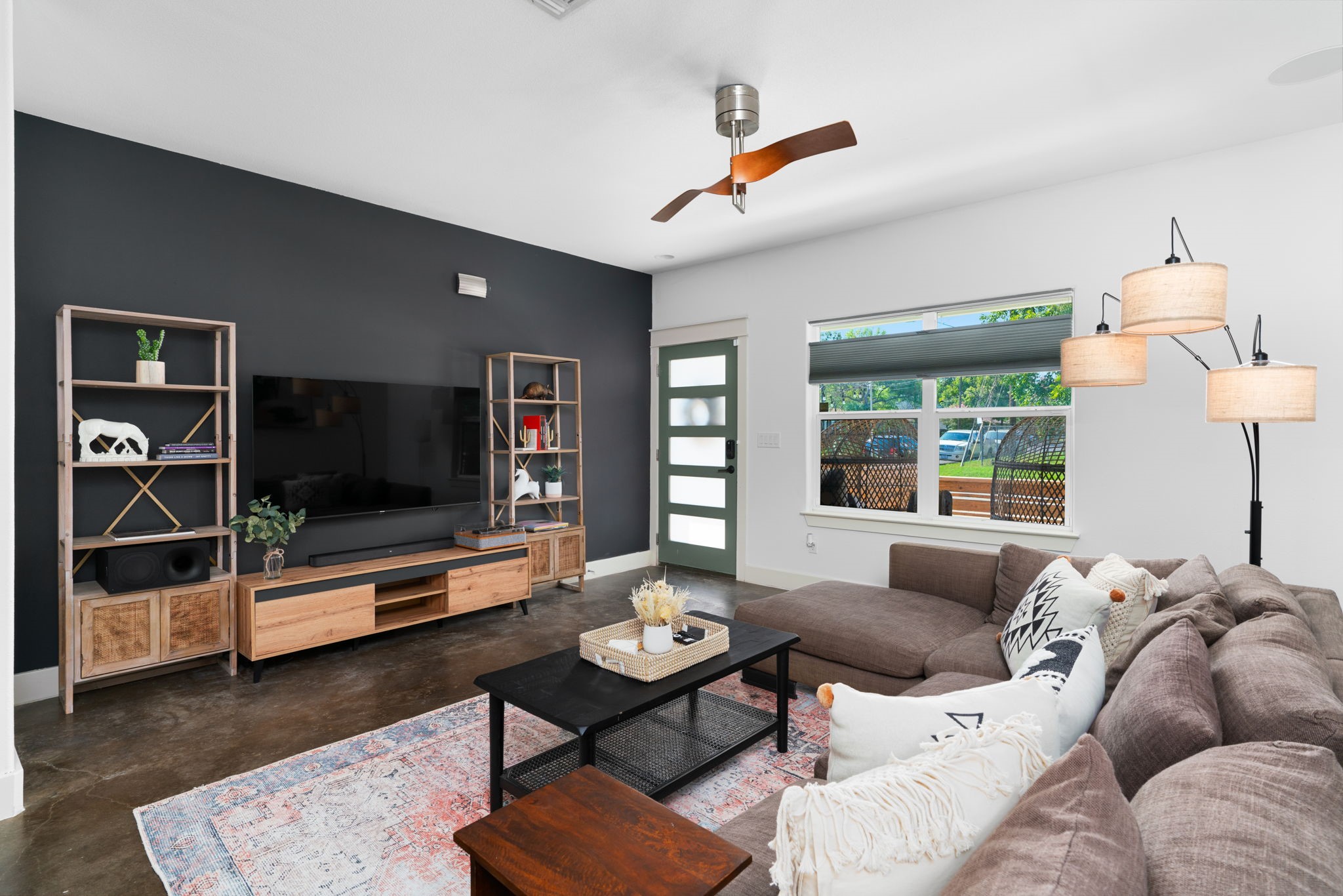 3012 Neal Street Austin, TX 78702 - Photo 7 of 39 a living room with furniture and a flat screen tv