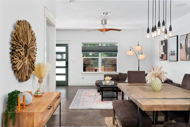 a living room with furniture and window