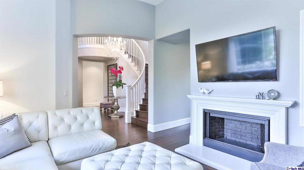 3561 Giddings Ranch Road Altadena, CA 91001 - Photo 5 of 60 a living room with furniture and a fireplace