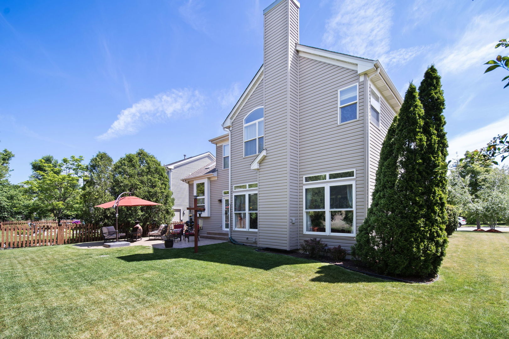 2254 Barrett Drive Algonquin, IL 60102 - Photo 39 of 49 a view of a house with backyard sitting area and garden