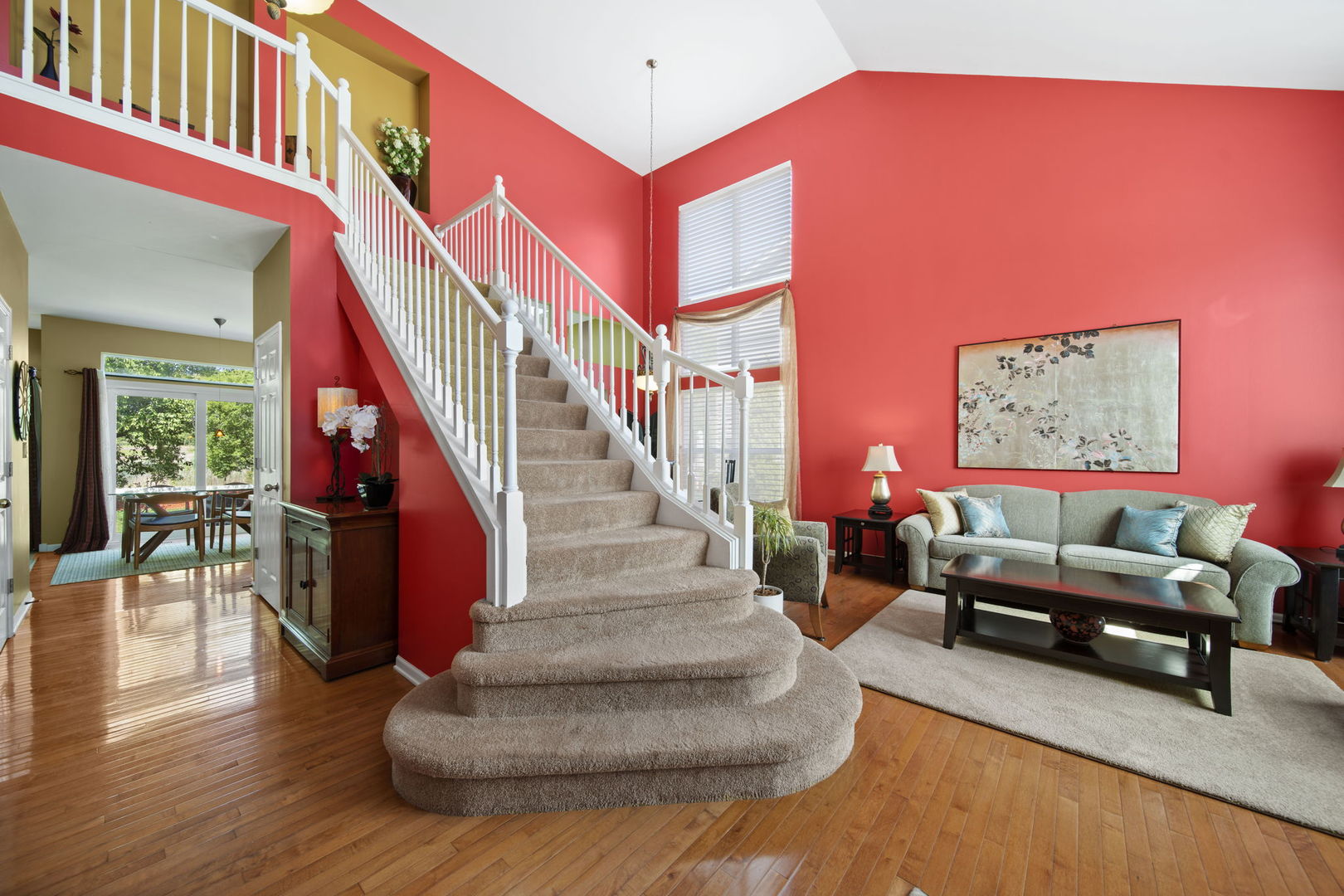 2254 Barrett Drive Algonquin, IL 60102 - Photo 4 of 49 a living room with furniture and stairs