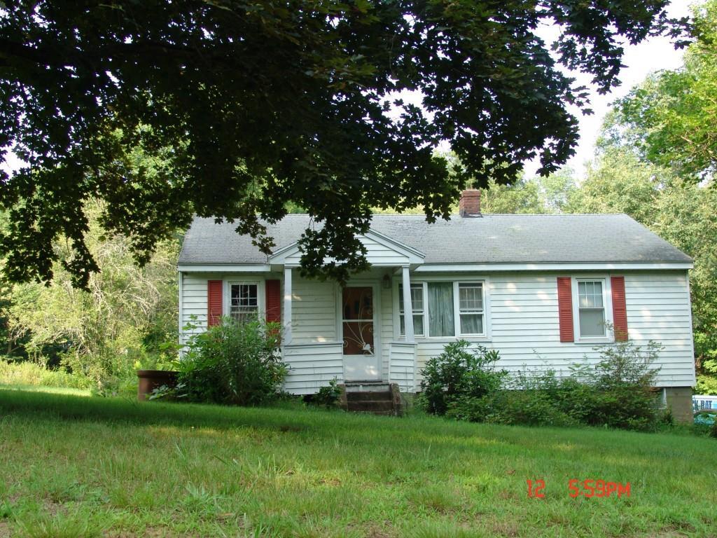 38 Lohse Road Willington, CT 06279 - Photo 1 of 1 a front view of a house with a garden