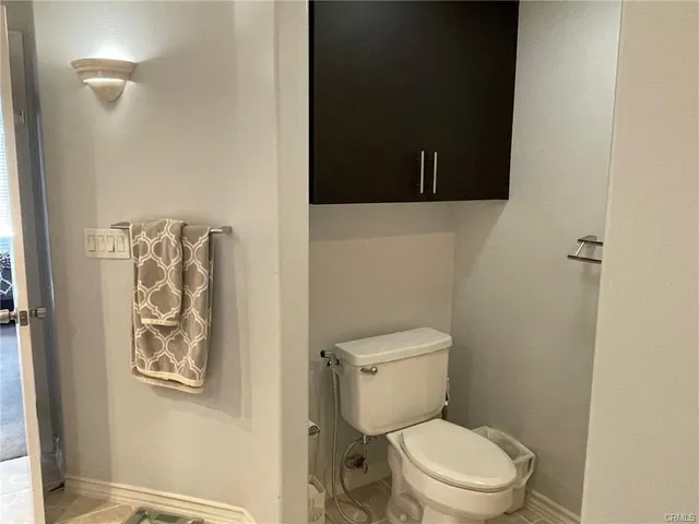 a bath room with a sink and a mirror