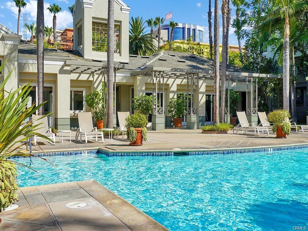 2233 Martin, Unit 413 Irvine, CA 92612 - Photo 34 of 38 a view of a house with backyard and sitting area