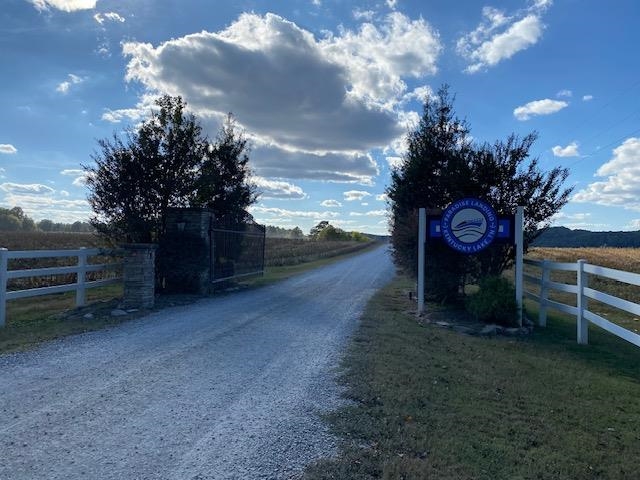 1929 Hardin Bottom River Road Clifton, TN 38425 - Photo 18 of 18 a view of a house with a yard