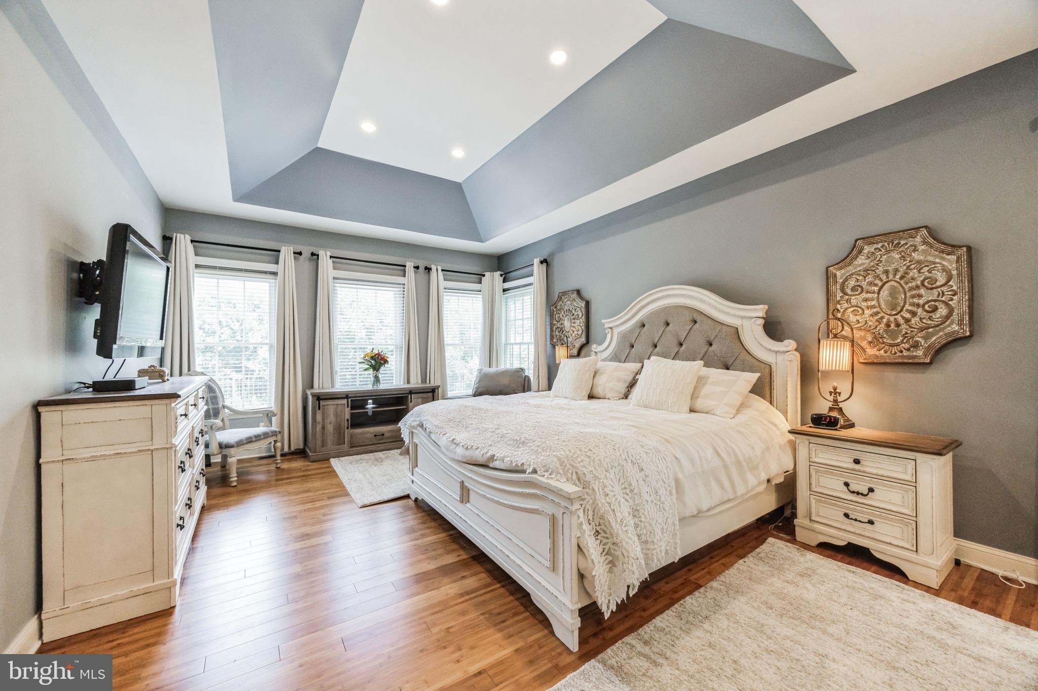 8 Kelso Lane Cinnaminson, NJ 08077 - Photo 19 of 38 a bedroom with a bed and wooden floor