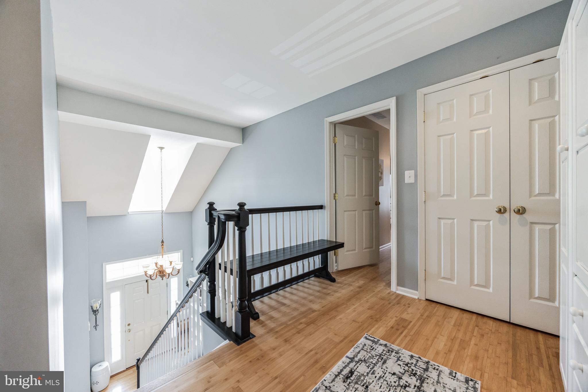8 Kelso Lane Cinnaminson, NJ 08077 - Photo 22 of 38 a view of entryway with wooden floor and stairs