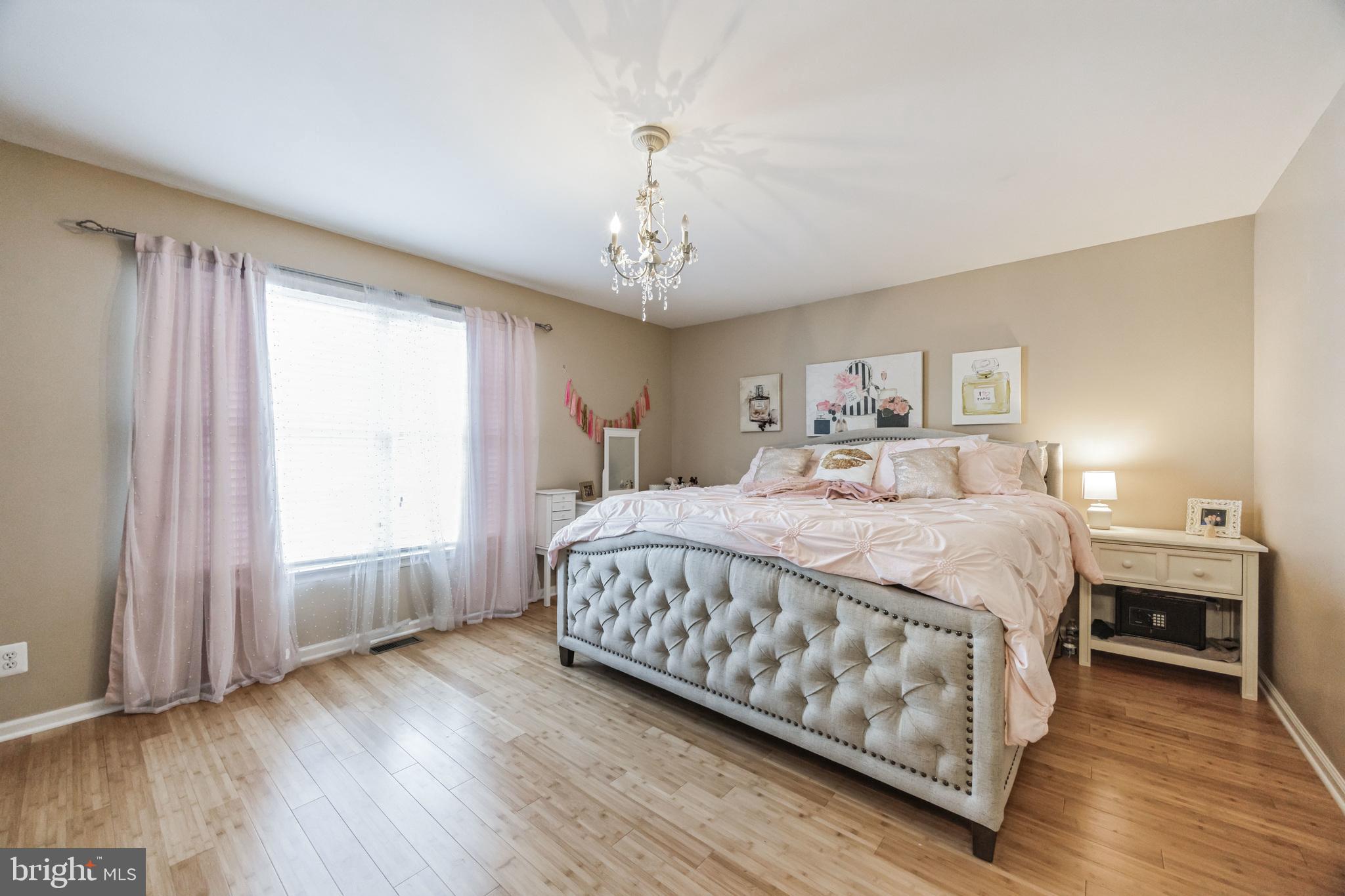 8 Kelso Lane Cinnaminson, NJ 08077 - Photo 23 of 38 a bedroom with a large bed and a window