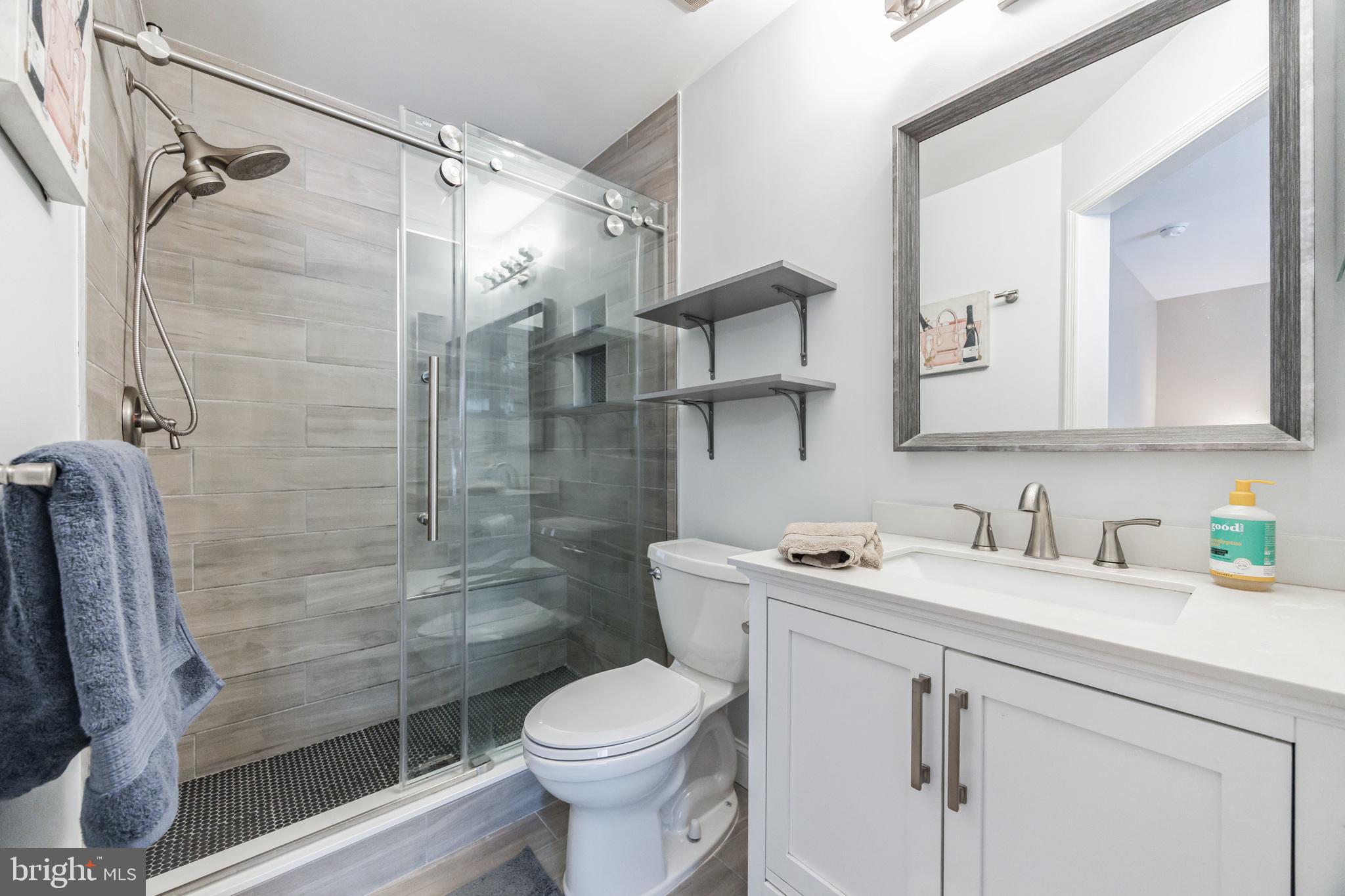 8 Kelso Lane Cinnaminson, NJ 08077 - Photo 24 of 38 a bathroom with a sink toilet and shower