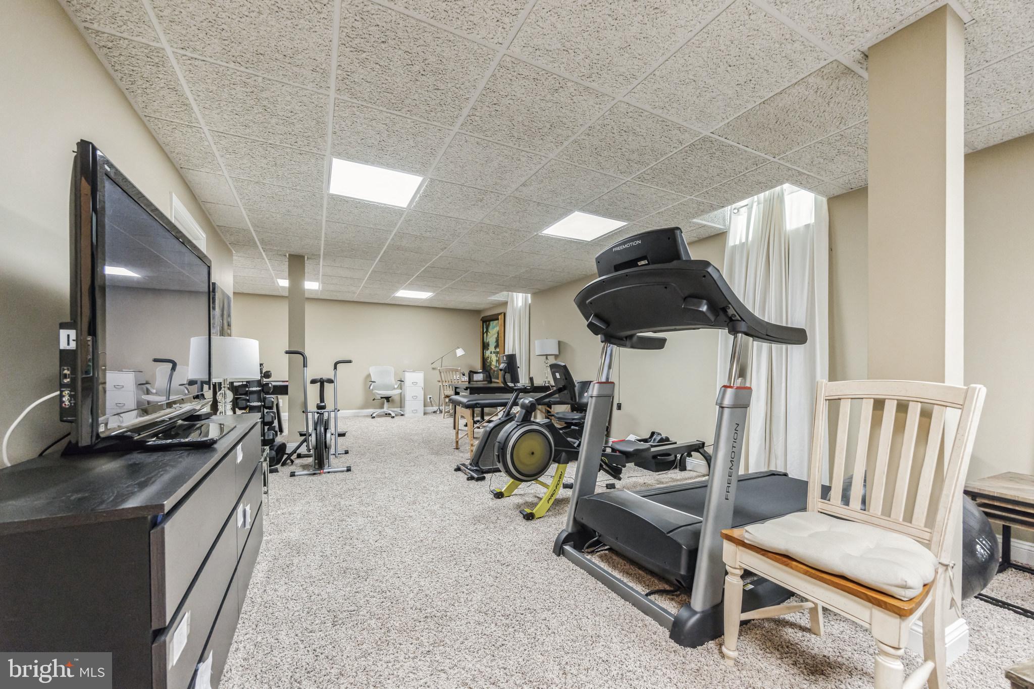 8 Kelso Lane Cinnaminson, NJ 08077 - Photo 28 of 38 a view of a room with gym equipment